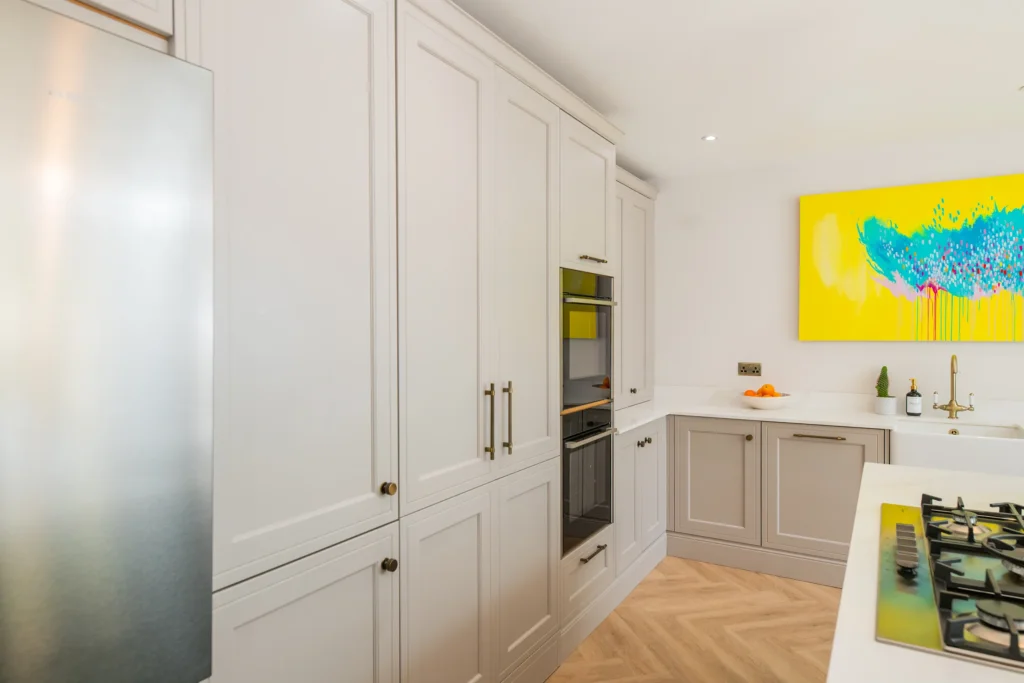 Artisan oak veneer kitchen with concealed walk-in larder and coffee station